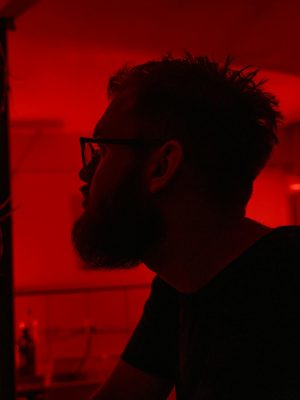 Man in Black Crew Neck Shirt Wearing Eyeglasses