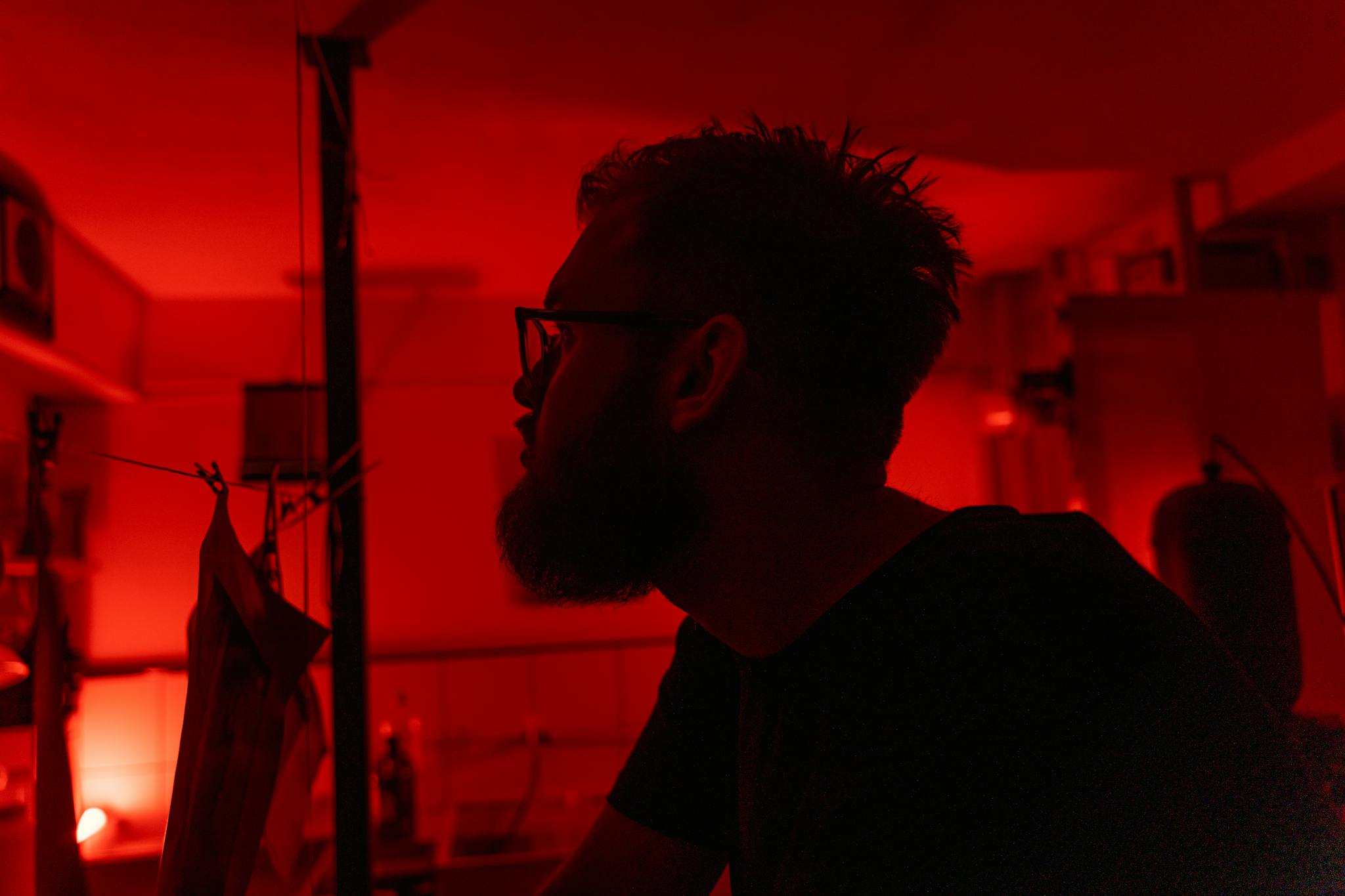 Man in Black Crew Neck Shirt Wearing Eyeglasses