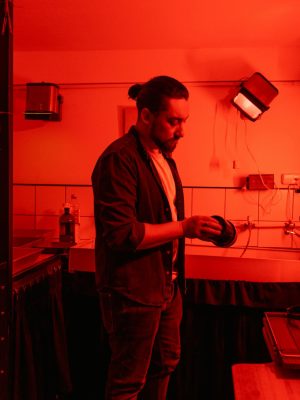 Man in Black Dress Shirt Holding Black Smartphone