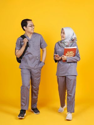Man in Gray Polo Shirt and Pants Standing Beside Man in Gray Polo Shirt