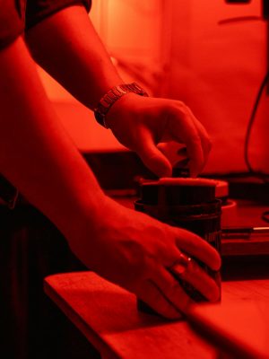 Person Holding Black Ceramic Mug
